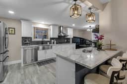 Como Lake Park Retreat | Hot Tub + Designer Home - Image 4